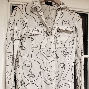 White blouse with faces all over print